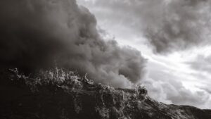 gray clouds in dark sky with waves