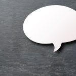 A bland chat bubble on gray background