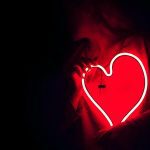 red neon light in the shape of a heart