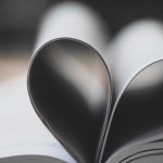 two pages in a book in the shape of a heart