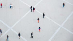 picture-of-people on a paved area with squares